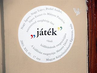 játék